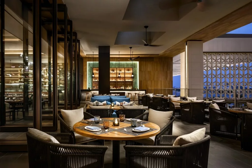 Interior of La Mar by Gastón Acurio in Dubai, showcasing a vibrant and luxurious Peruvian restaurant design by leading restaurant design firms