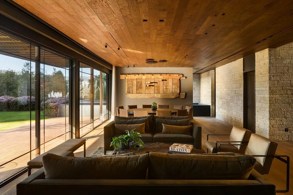 Warm and inviting interior of Ochre House with natural light and ochre tones