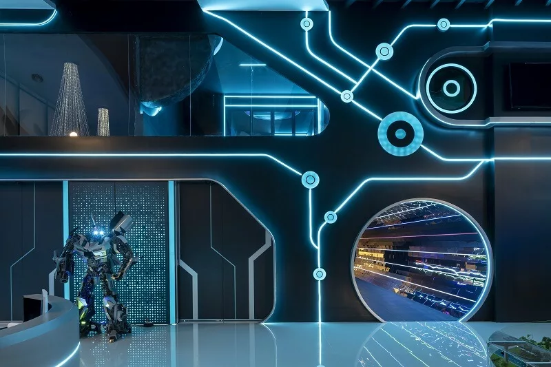 Futuristic robot in the entry rounded hall with advanced wall designs in the Futuristic Galaxy Walk.