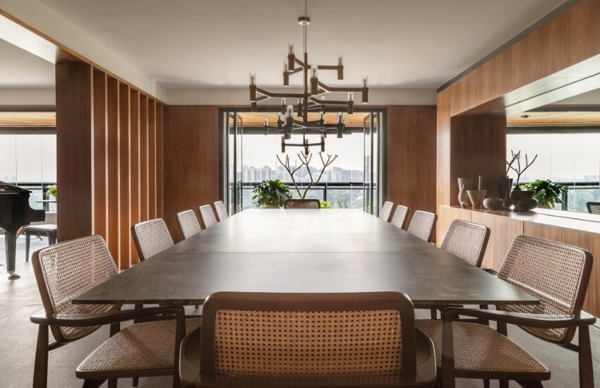 Modern kitchen-dining area with consistent flooring and neutral tones