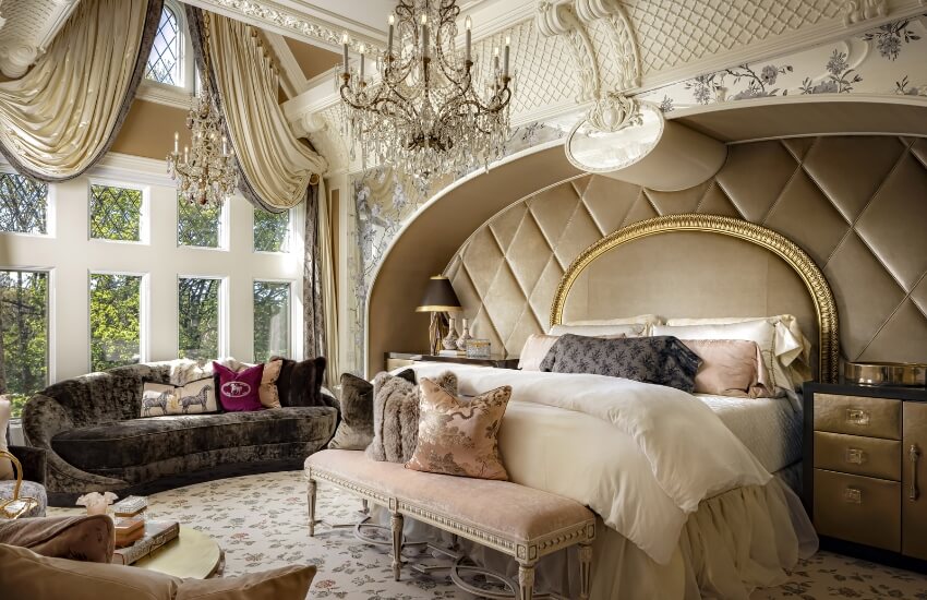 Sumptuous bedroom featuring plush textiles, ornate headboard, and bespoke furnishings