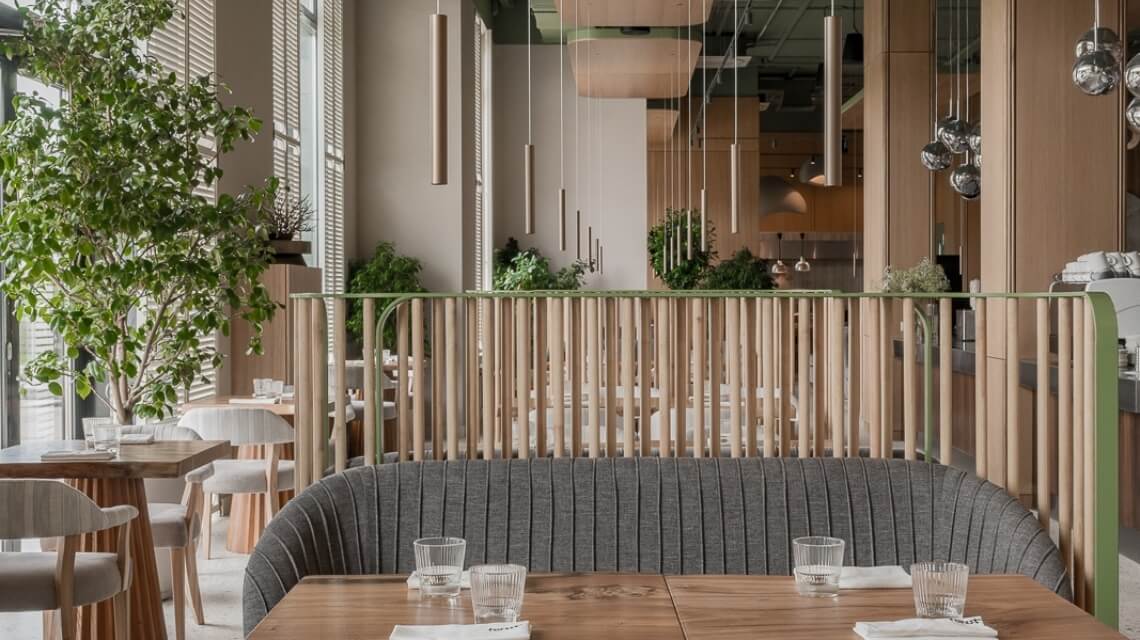 Nature-inspired restaurant interior design trends with greenery - Forest by Studio40.