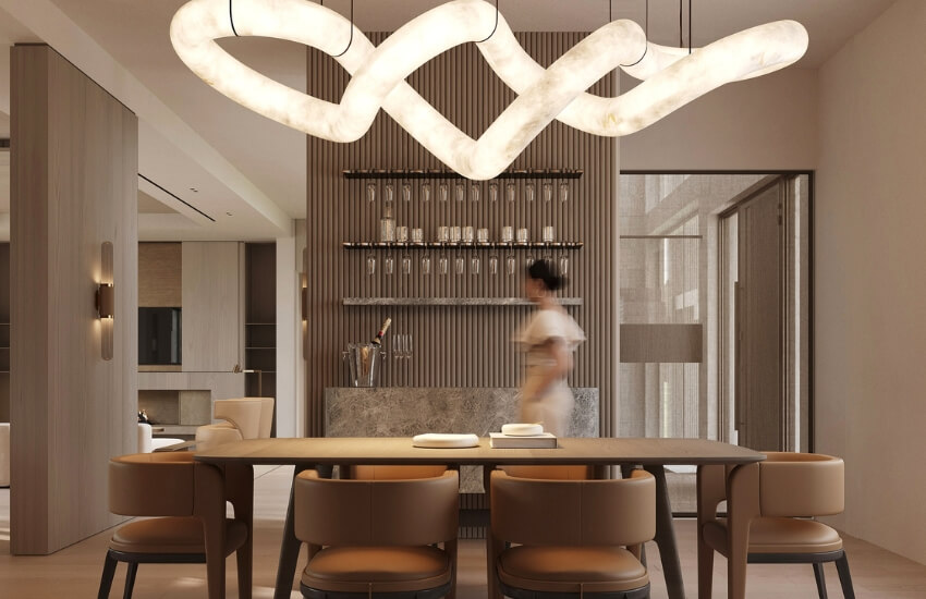 Elegant dining room with sculptural pendant lighting and neutral tones