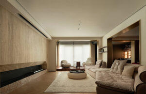 A view across the living room showcasing the apartment’s flowing spatial layout