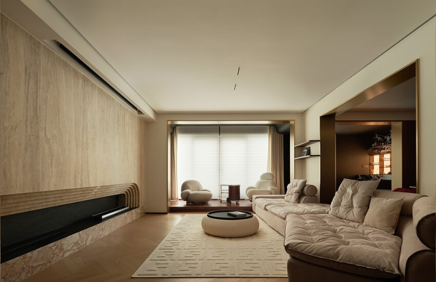 A view across the living room showcasing the apartment’s flowing spatial layout
