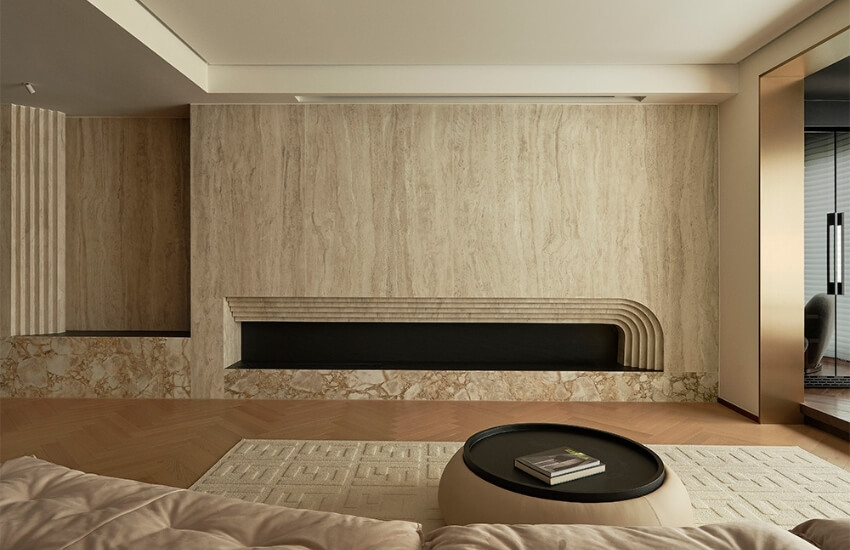 Minimalist living room with sculpted walls and soft natural light