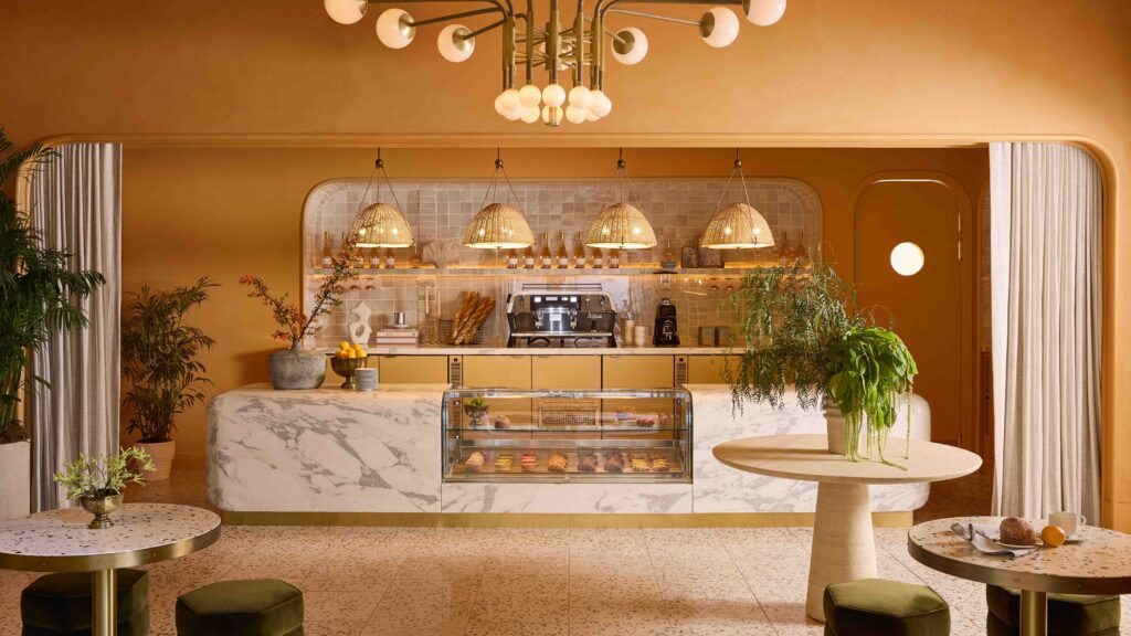 Cafe Goldie marble pastry counter and curved design elements