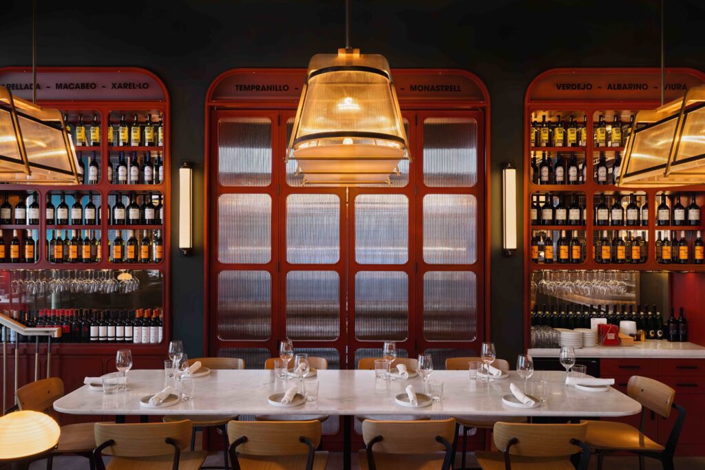 Boqueria Atlanta arched metalwork and warm lighting dining space