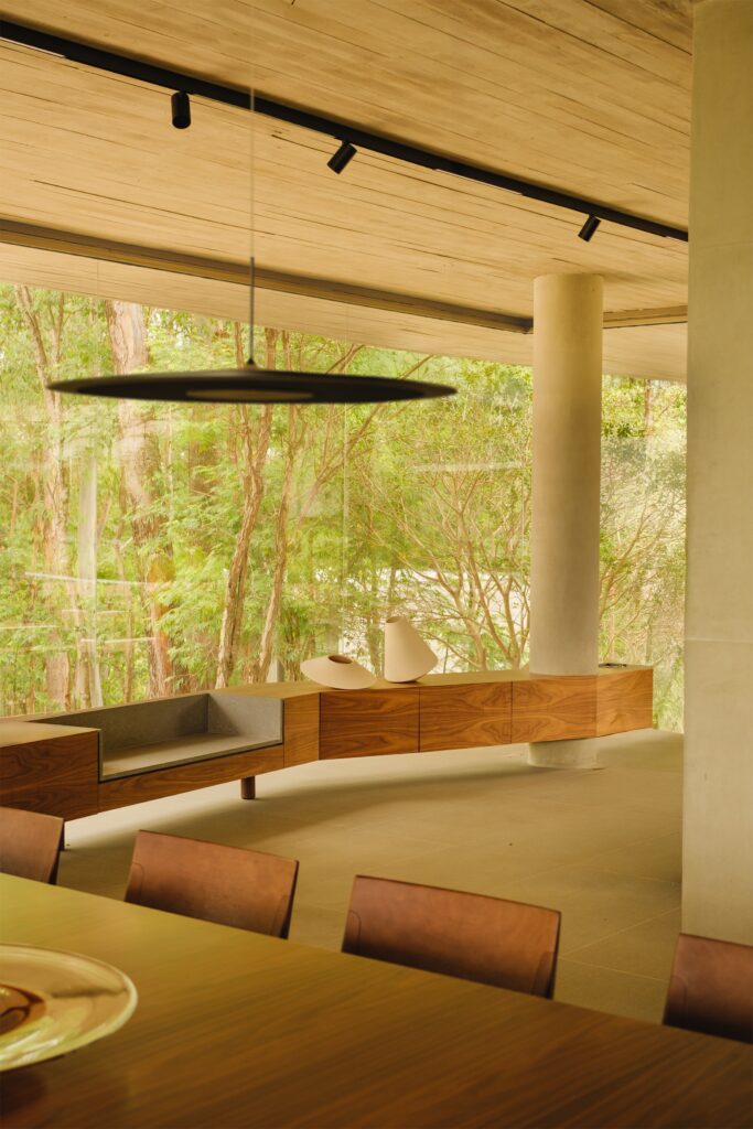 Private volume with brise-soleils above the main house