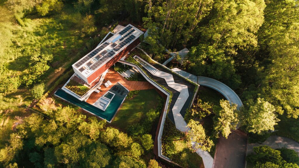 14.5-meter walkway bridge connecting courtyard to forest area