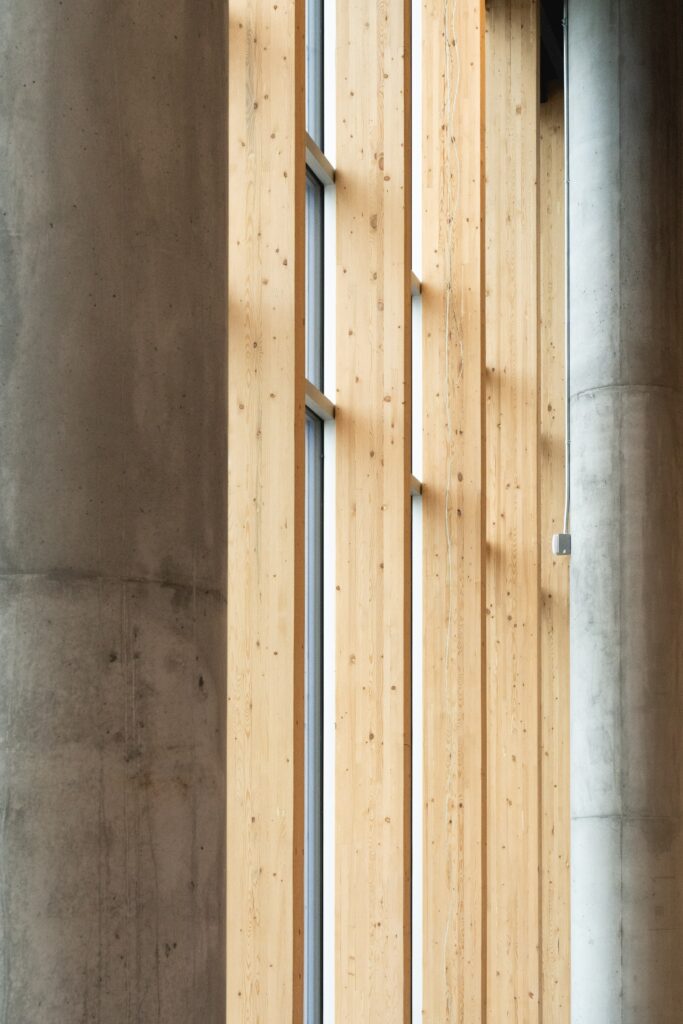 Aux Mille-Voix High School material detail wood stone and natural finishes
