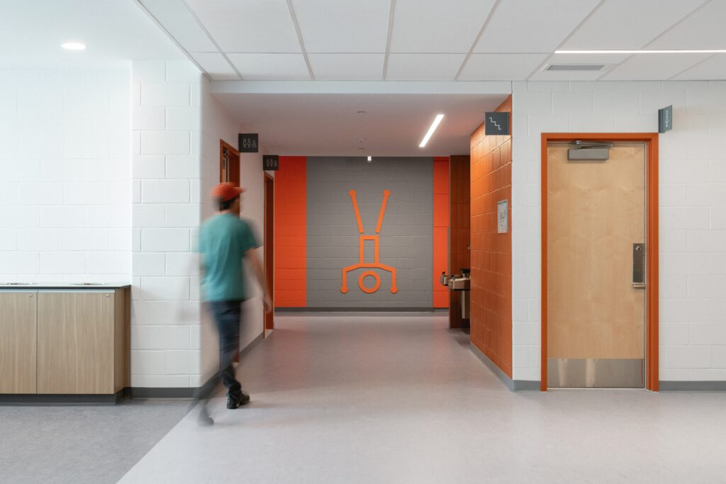 Aux Mille-Voix High School restroom interior modern public school washroom design
