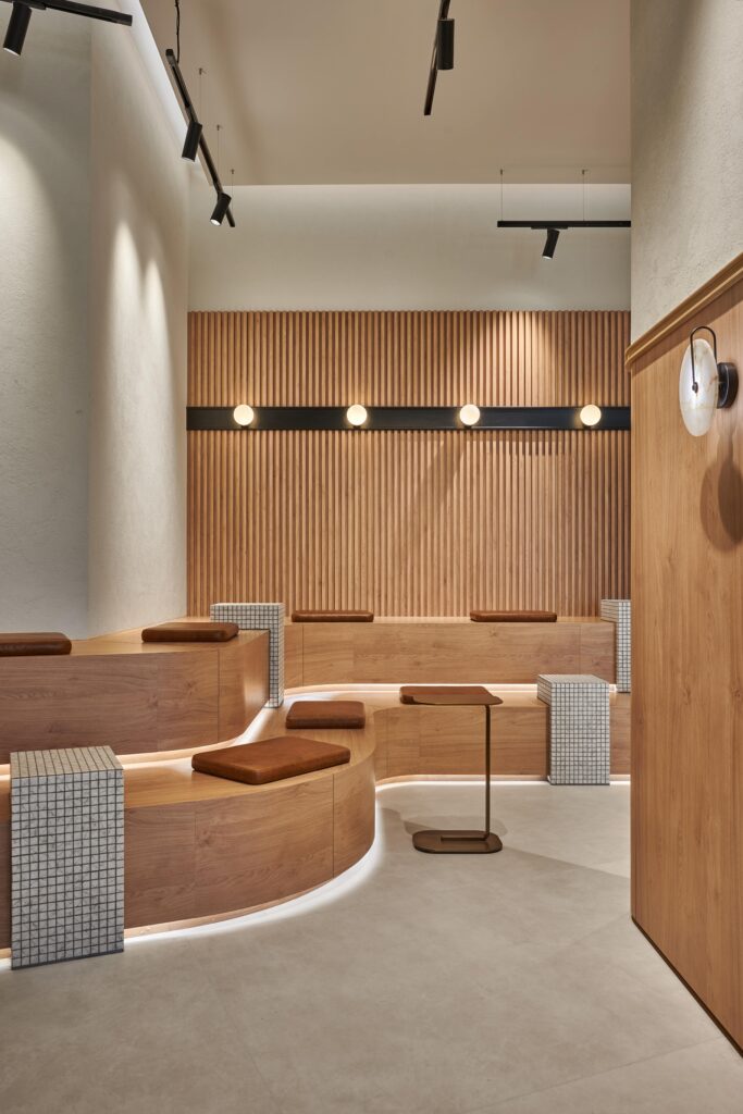 Waiting lounge area with soft seating in design studio