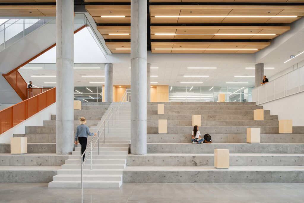 School interior corridor with natural materials and open design