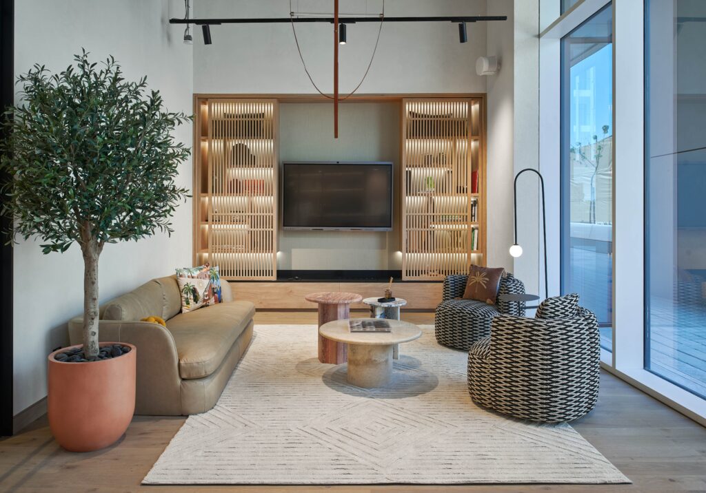 Open lounge with sofas and natural textures at Mustard and Linen Interior Design Studio